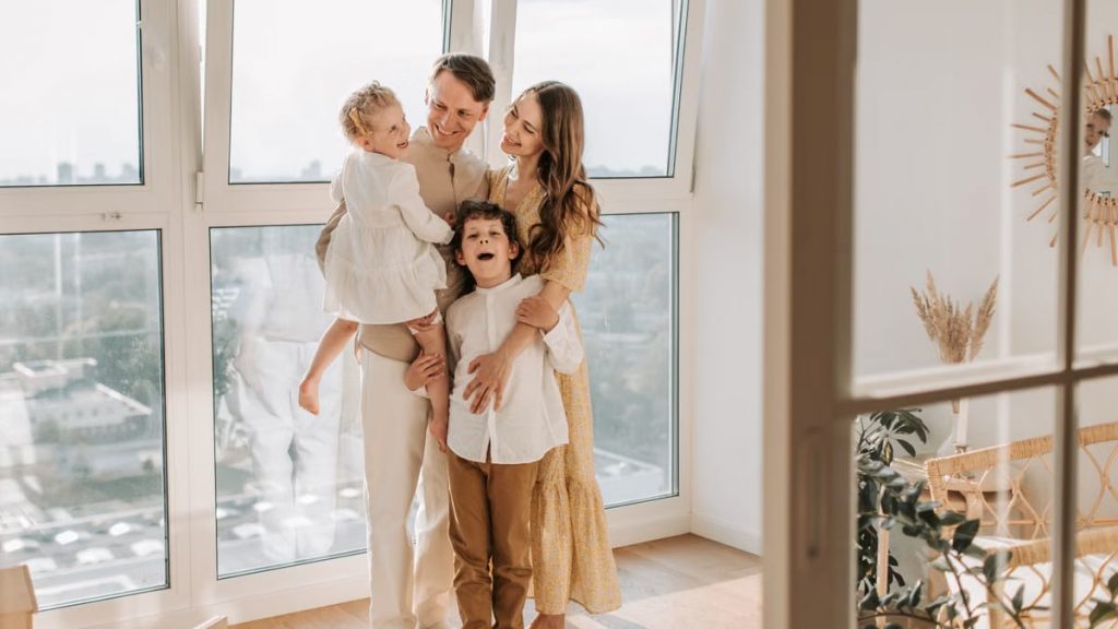 Warm family moment captured by a bright window, symbolizing love and togetherness.