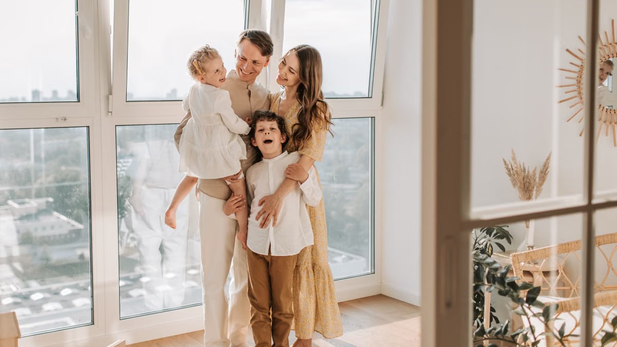 Warm family moment captured by a bright window, symbolizing love and togetherness.